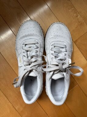 Puma White Leather Lace-Up Sneakers with Gold Accents